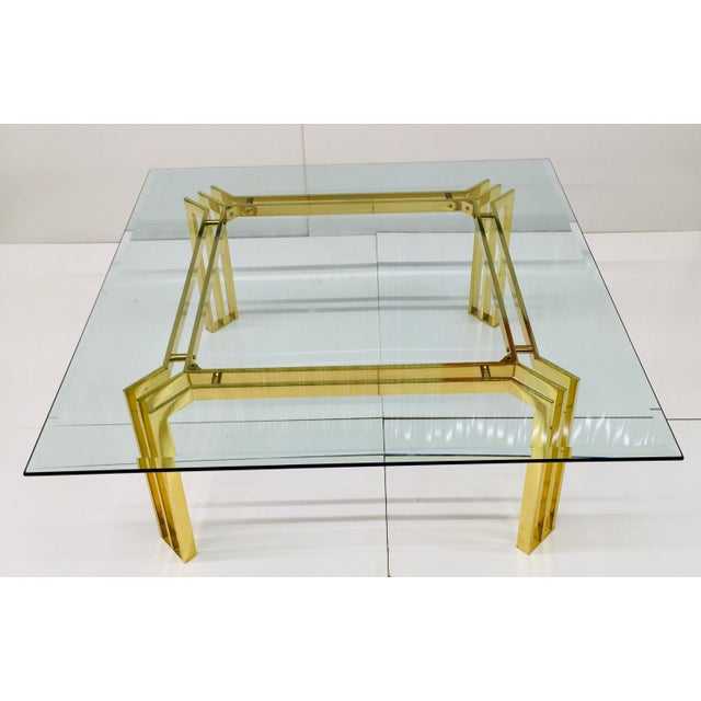Beautiful Italian Mid-Century Modern Thin Line Square Brass Coffee Table. It's used in good condition with normal wear...