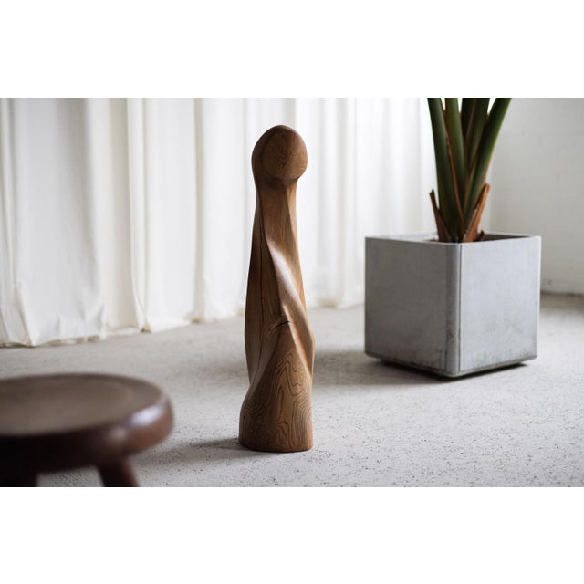 Beautiful shaped abstract modern scultpture made in France, 1960s. This sculpture is made from solid oak wood showing its...