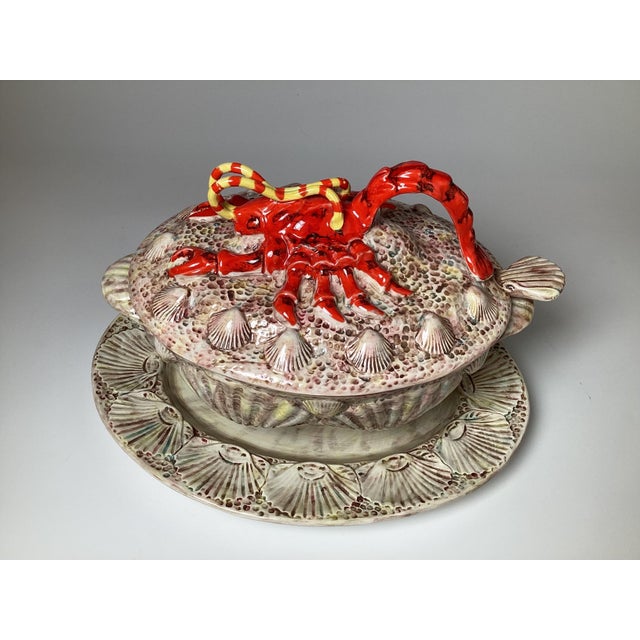 A whimsical hand painted Italian ceramic tureen with lobster. The lobster lid with shell design on bowl with original...