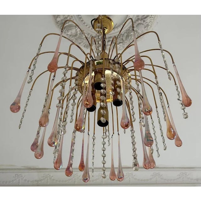 Magical and twinkling chandelier, made of pure Murano Glass. An authentic jewel of Murano artistry. One could spend hours...