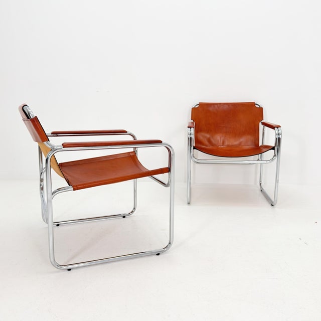 Mid-Century Italian Leather & Chrome Lounge Armchairs – Jox Interni, 1970s A striking chair of authentic 1970s Italian...