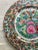 Thousand Butterflies pattern in a famille rose medallion style plate by Japanese Porcelain. Marked on the underside....