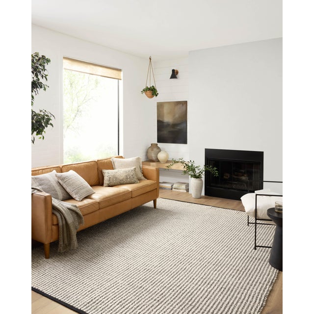 The Colton Collection by Angela Rose x Loloi is a new take on the staple jute rug, blended with cotton for added softness....