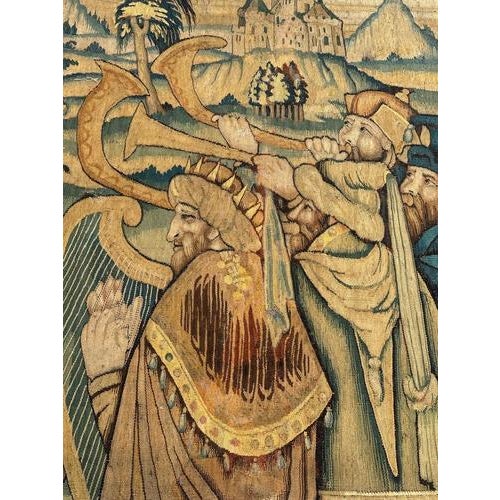 A striking fragment of a 17th-century Aubusson tapestry depicting a lively musical scene. The composition features a group...