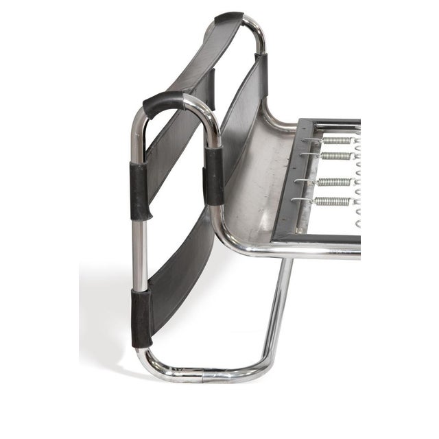 Daybed designed by Marcel Breuer in 1920s, realized in tubular chromed metal frame and leather bands. Produced in 1970s....