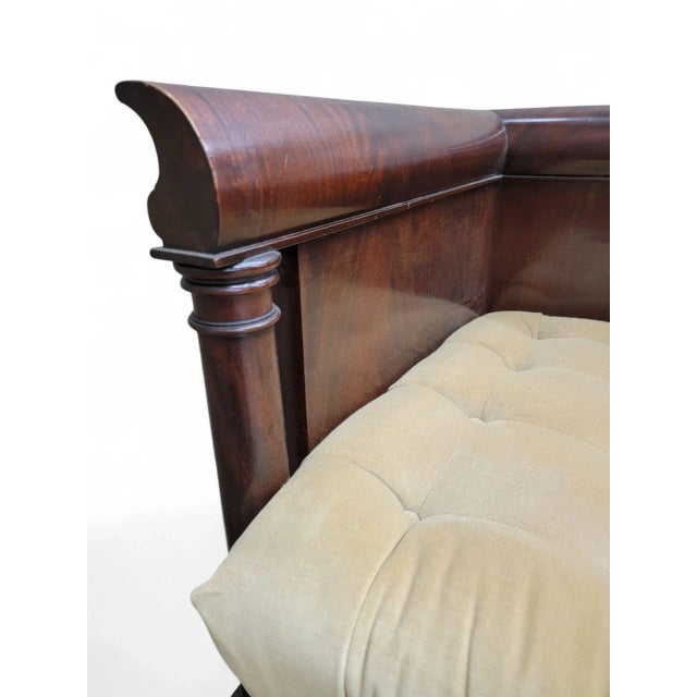 Antique English Colonial Mahogany Cube Chair The seat is button tufted, adding a touch of sophistication and plush...