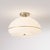 The Morelli Semi-Flush Mount is a modern lighting fixture designed by the NOVA Design Team in 2026. This elegant semi-...