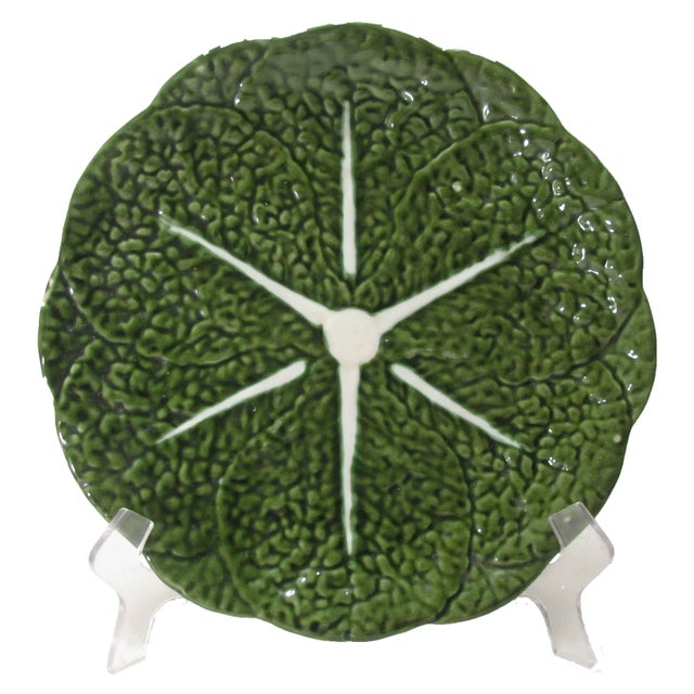Large green majolica round platter with cabbage leaf motif. Backstamp of Belo Portugal. Good condition; minor glaze...