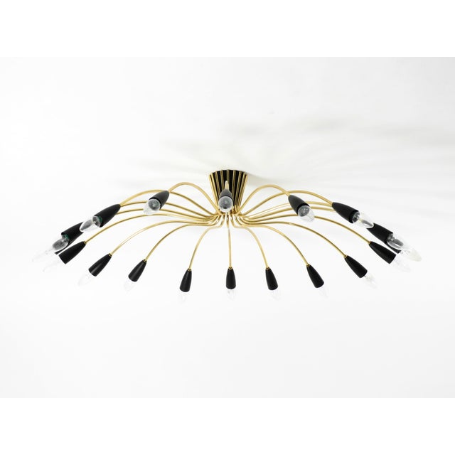 Beautiful, large mid-century modern brass sputnik ceiling lamp with 18 arms, in very good original condition. Made in...