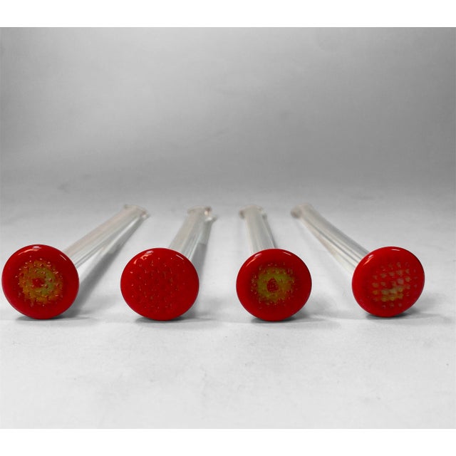 Discover these elegant and oh-so-delicate glass cocktail muddlers, circa the 1940's. They feature a rounded tip for the...