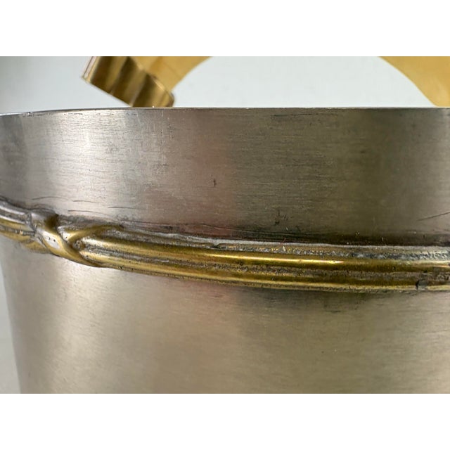 This is a vintage handcrafted pewter and brass decorative dresser box. This pewter box has a faux boars tusk as its handle...