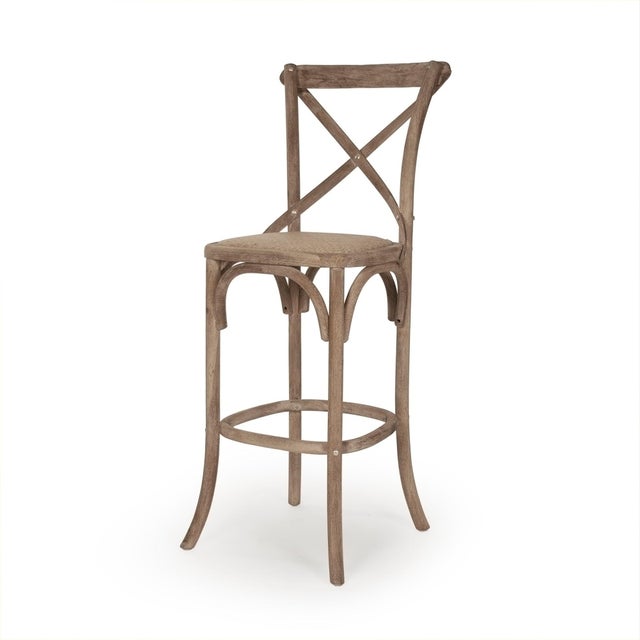 The Parisienne Cafe Bar Stool from Zentique brings the classic French cross-back bistro chair to bar height at 30"....