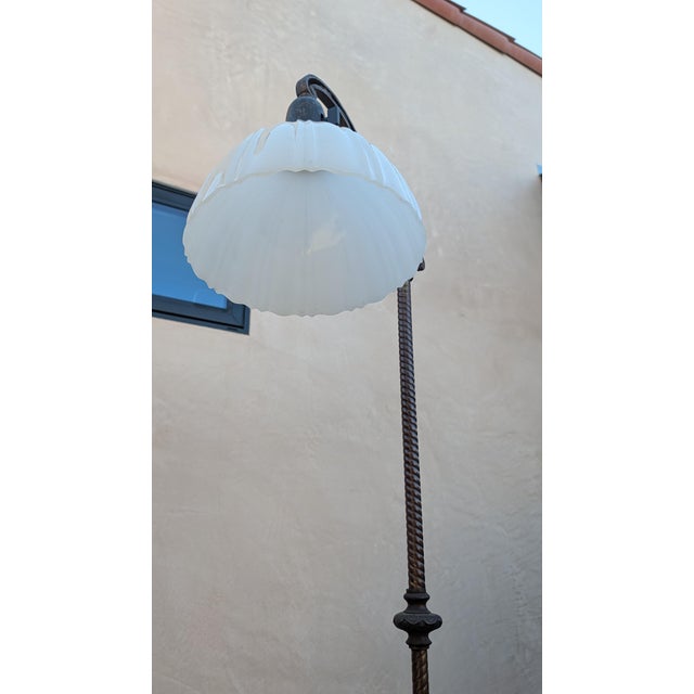 A magnificent example of turn-of-the-century American lighting craft. This stately bridge floor lamp features an open...