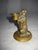 This lovely Thimble holder is air bronze and represent a dog holding a hate in is mouth were the thimble would be place ,...