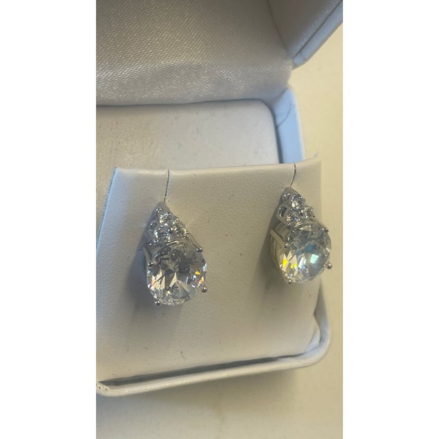 stud done in quality cz /sterling with touch of crown on top..4 x.4