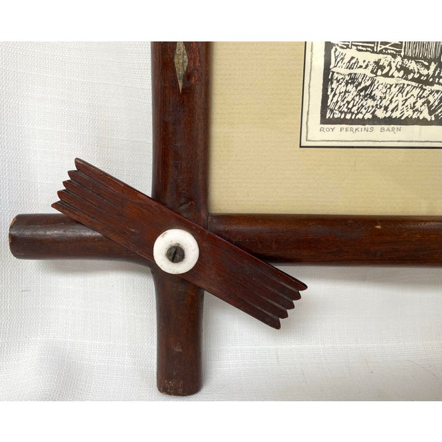 This wonderful antique wood frame features white porcelain knobs at criss-cross corners. It includes original old glass &...