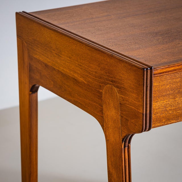 Dressing table with a drawer on the left side and a lift-up compartment with mirror on the right. The slightly splayed...