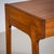 Dressing table with a drawer on the left side and a lift-up compartment with mirror on the right. The slightly splayed...