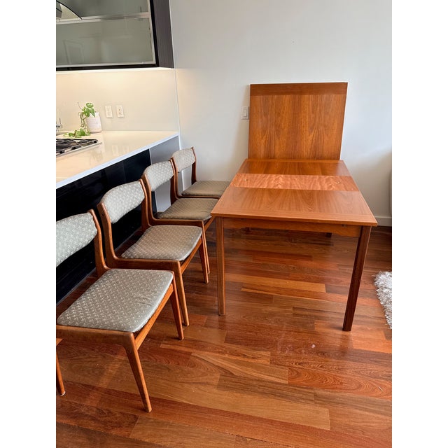 Danish Teak Draw-Leaf Extension Dining Table — Made in Denmark, c. 1960s A handsome Danish modern teak dining set —...