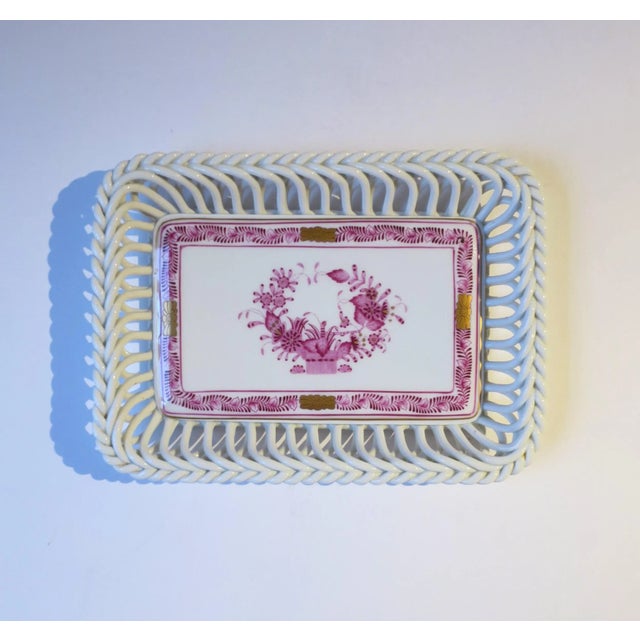 A beautiful white porcelain tray dish vide-poche by luxury marker Herend, circa 20th century, Hungary. This rectangular...
