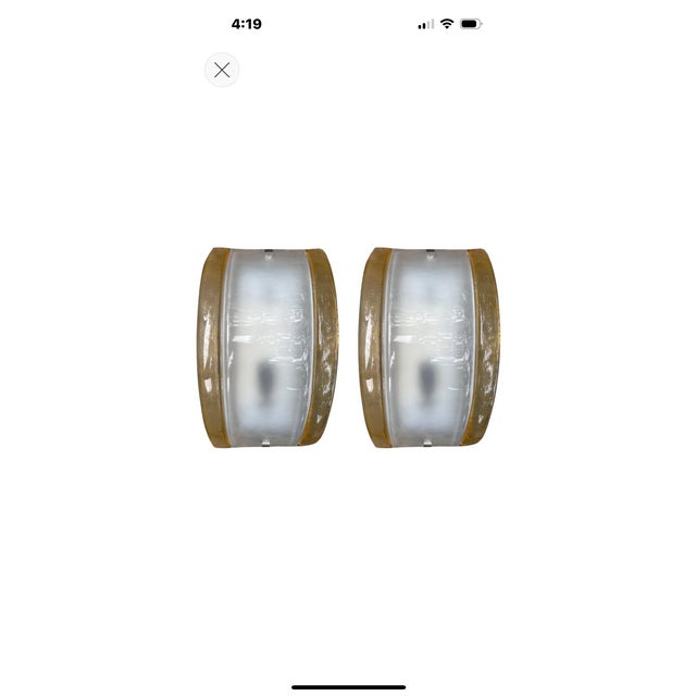 Pair Of Murano Glass Sconces By Mazzega. Offered is a stunning pair of Murano sconces designed by Carlo Nason for Mazzega...