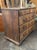 This product is a handsome 18th century English walnut chest of drawers, boasting a classic and timeless design. The chest...