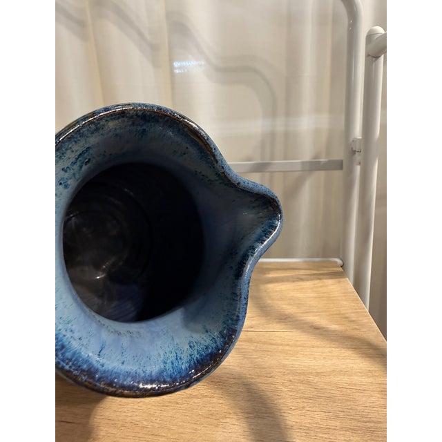 A commanding presence for the table or shelf—this hand-thrown stoneware pitcher by C. B. Craven for Teagues Pottery...