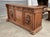 Very handsome French credenza/sideboard. This piece features 2 barley-twist columns and 2 carved doors for storage. A...