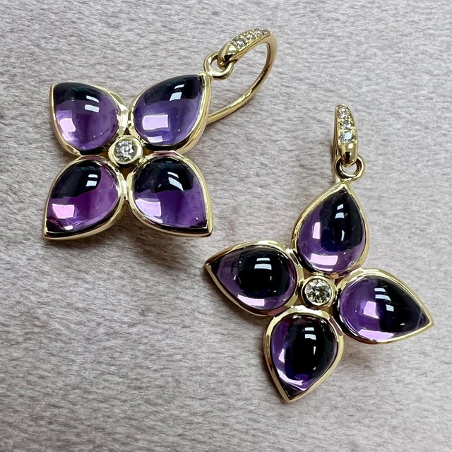 Created in 18 karat yellow gold Amethyst 9.50 carats approx. Diamonds 0.14 carat approx. French wire for pierced ears...