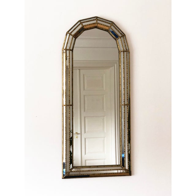 Pair of vintage Venetian beveled mirrors in Spanish style, dating from the 1990s. Each mirror features a handcrafted glass...