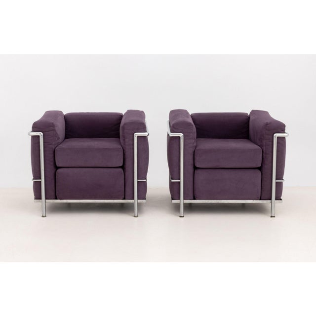 Le Corbusier (Charles-Edouard Jeanneret, Swiss/French, 1887-1965) Pair of Model LC2 Club Chairs, each with purple suede...
