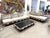 A wonderful vintage Adrian Pearsall sofa set. It features 2 sofas and a coffee table. The pieces have been redone in a...