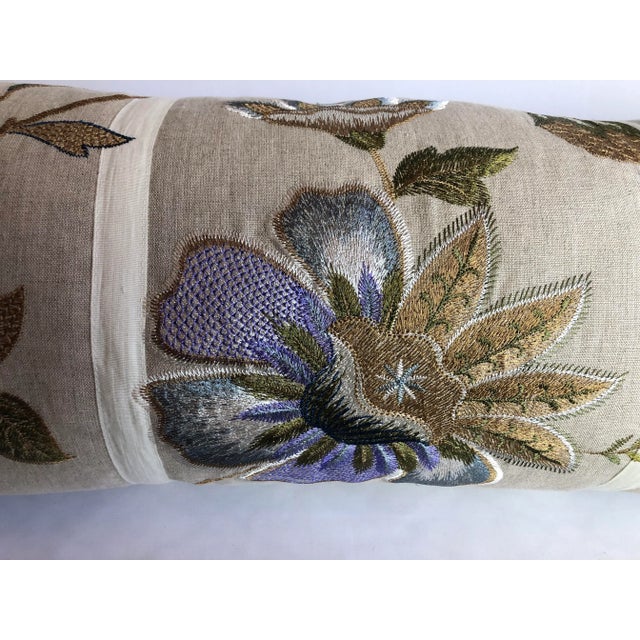 This beautiful Cowtan and Tout embroidered with ribbon accent bolster is so romantic. We have lined the ends with...
