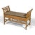 This lovely Chinoiserie style bench constructed of bamboo with a woven cane seat and a loose upholstered seat cushion has...