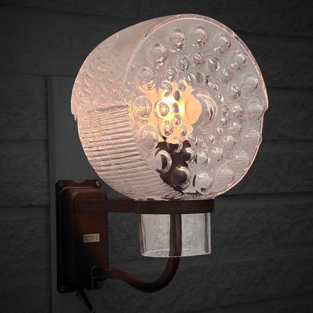 A sculptural outdoor facade light produced by the Swedish manufacturer Westal in the 1960s. The fixture combines timeless...