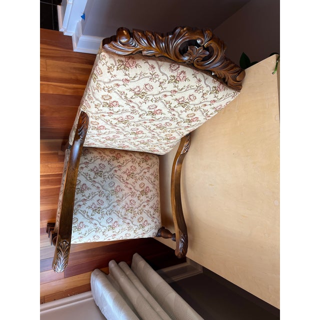 A beautifully crafted Late Victorian Jacobean Revival walnut armchair, dating to approximately 1890–1910, featuring...