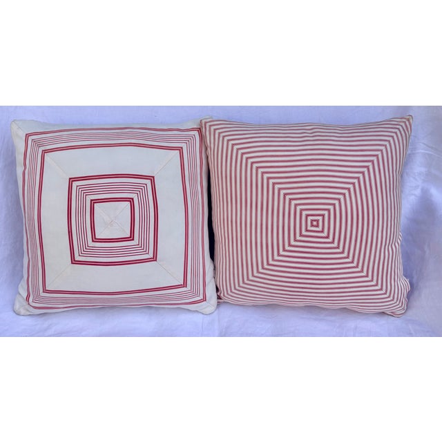 This pair of decorative pillow covers from Ralph Lauren in crisp red and ivory stripes perfectly embody the classic...