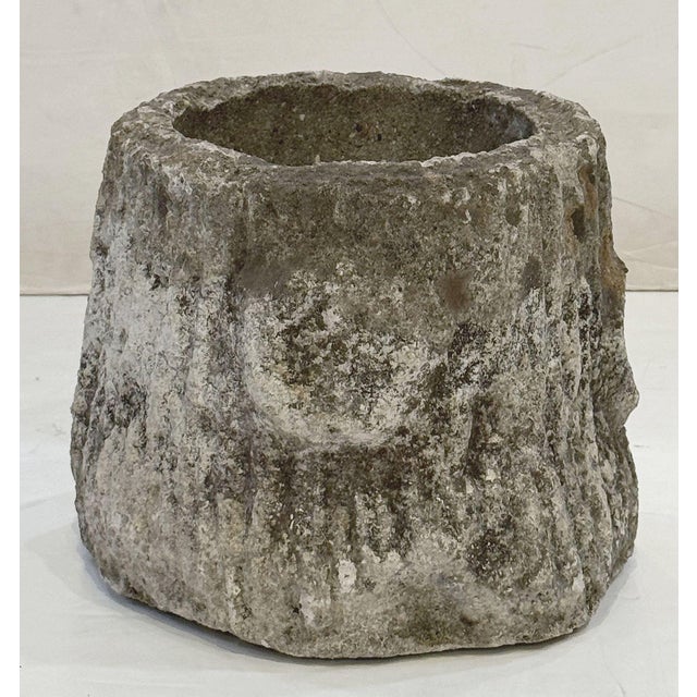 A set of four French faux bois round garden pots or planter urns of composition stone - each planter featuring a design of...