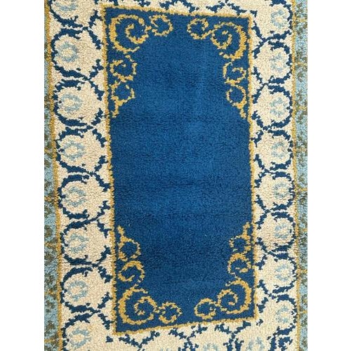 Beautiful vintage French Cogolin rug with a simple modern design and nice colours with a blue background, yellow, green,...
