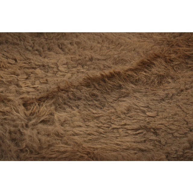 This handmade 7x8 contemporary bison hide rug from Rug & Kilim represents an exciting new collection of rare large-size...