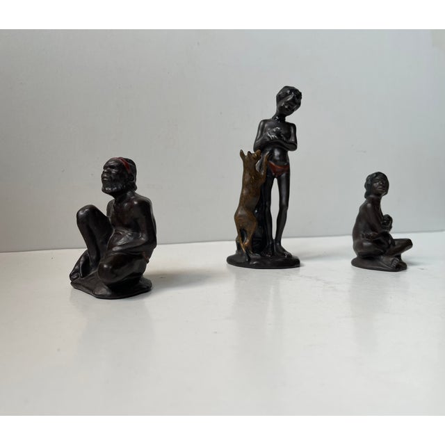 A very rare and collectable group or family of slip pottery figurines from australian darbyshire. The set of 3 consists of...