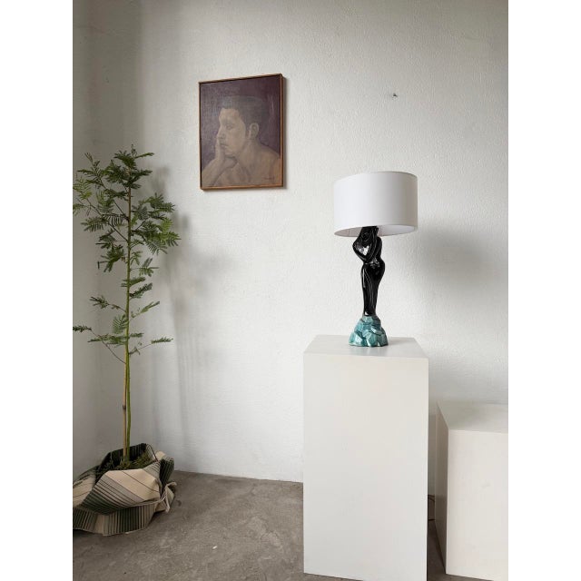 Old Monaco table lamp or desk lamp signed Monacera on its base representing a woman on a rock, art deco style. All finesse...