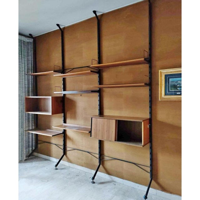 A rare find original Ico Parisi wall unit. Its elongated metal legs gives a sense of luxury elevating the unit. The...