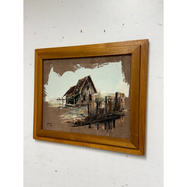 Design Plus Gallery presents a Vintage Artwork of a Time Worn Barn in a Wood Frame that is Signed Lace. This painting...