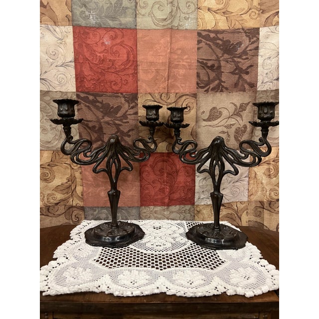 Set of 2 matching Art Nouveau Sensuous Woman candelabras in cast iron with an antique bronze finish. The stem depicting a...