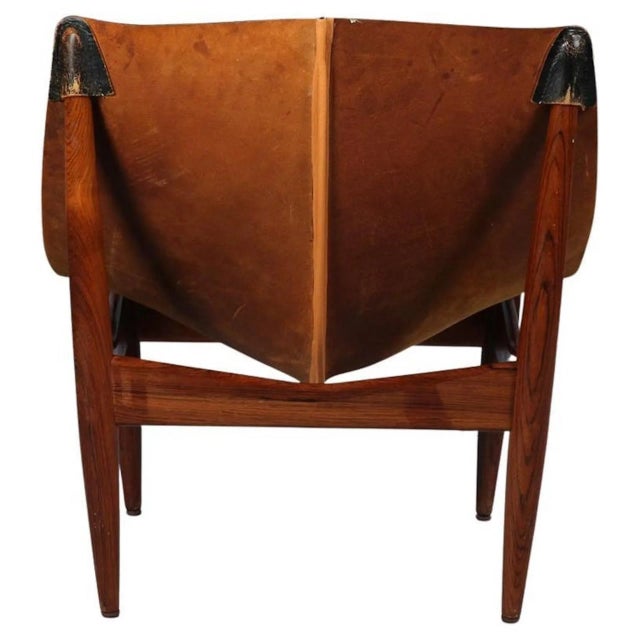 Armchair and Wikkelso Illum '272' for C.F. Christiansen, Sweden, 1960s Rosewood feet are tapered and slightly tilted...