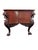 Gorgeous, heavily carved mahogany partner's desk featuring winged griffins, gargoyles, bird and floral motifs throughout...