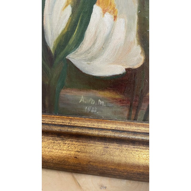 Listed is a vintage framed impressionist water lilies oil painting. The framing adds a touch of elegance and...