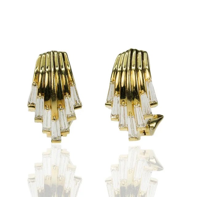 18k Earrings with 14 tapered baguettes weighing apprroximately 3.50 carats 15.19 grams