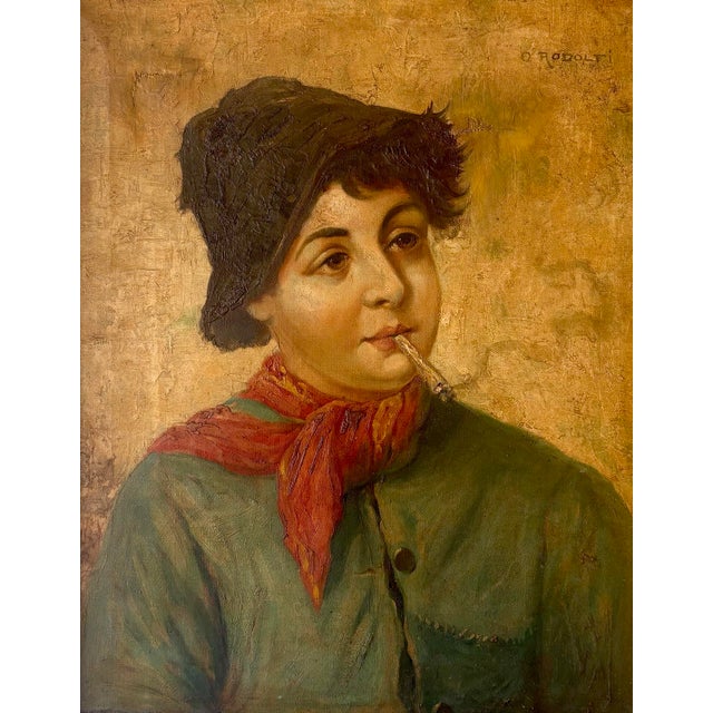 A charming 19th century oil on canvas portrait depicting a young boy with a cigarette resting between his lips. Dressed in...